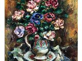 tableau représentant des fleurs dans un vase posé sur une table recouverte d'une nappe