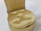 an image of a chair with a cushion on top of it