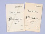pair of vintage french menus on a blue table cloth