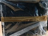 a plastic bag that has a black shirt in it