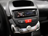 a car dashboard with a radio in it and a steering wheel