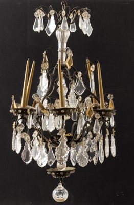 an image of a crystal chandelier hanging from a ceiling