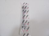 a tie that is wrapped in plastic on a table