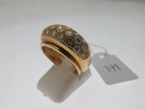 an image of a gold and diamond ring with a price tag