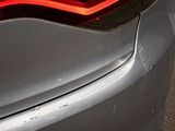 a close up of a car ' s tail light and tail light