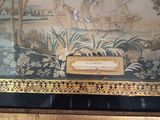 a picture of a painting on the wall of a room
