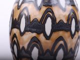 two vases sitting side by side on a table
