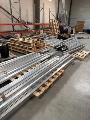 a lot of pallets that are sitting in a warehouse