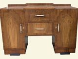 an image of a wooden cabinet with drawers and drawers
