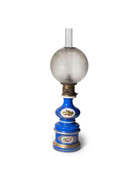 a blue lamp that is on top of a table