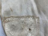 a close up of a piece of clothing with a pocket