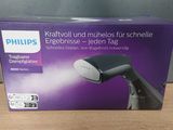 emballage d'un sèche-cheveux Philips posé sur une table
