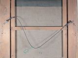 a picture of a picture of a window with a wire attached to it