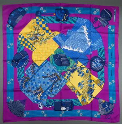 blue, yellow, and purple silk scarf with blue and yellow patterns