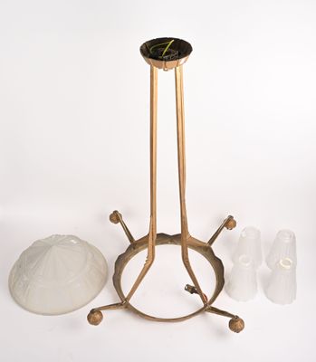 a table with a clock on top of it next to a pair of shoes