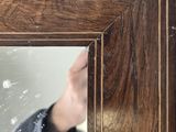 a man taking a picture of himself in a mirror