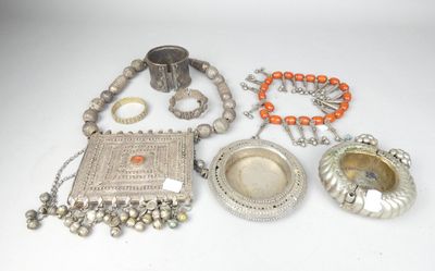 an assortment of silver and coral jewellery including a silver plate, a silver tray, a silver ring and a silver necklace