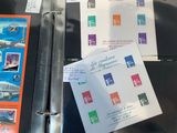 a binder with a lot of different stamps on it