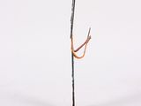 a sculpture of a tree with a branch on top of it
