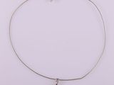 a necklace with a pink tear shaped stone on a silver chain