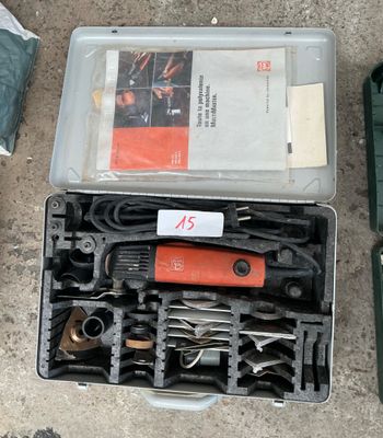many tools in a case on the ground