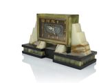 a clock that is sitting on top of a table