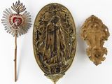 three items that include a medal, a stick, and a broochet