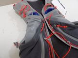 a pair of shoes and a backpack on a table