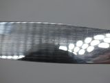 a close up of a person holding a knife