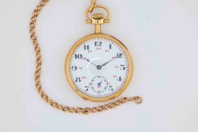 a gold pocket watch with a chain on a white surface