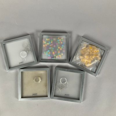 SWATCH - Lot de 5 bijoux Swatch emballage d'origine.