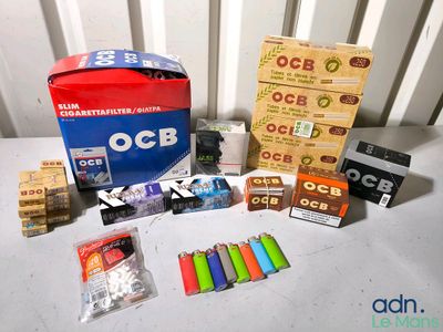 a box of cigarettes and other items sitting on a table