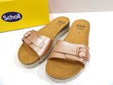 a pair of sandals that are on a table