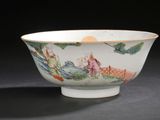 a white bowl with a painting on it on a table