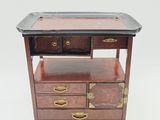 an image of a small wooden table with two drawers and a tray on top of it