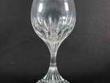 a close up of a wine glass on a black background