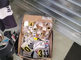 a box full of assorted items sitting on the floor