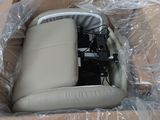 a box that has a seat in it and some wires in it