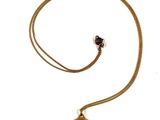 an image of a gold necklace with a buddha pendant on it
