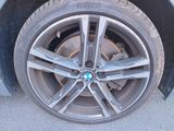 a close up of a tire on a car ' s rim