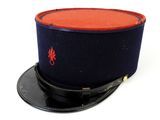 navy officer ' s hat with red and blue trim