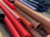 a lot of pipes that are laying out on the ground