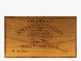 a wooden box with a label on it that says chateau sociale haut medoc