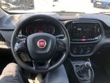 the dashboard of a car with a steering wheel and dashboard controls