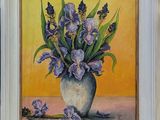 a painting of purple flowers in a vase on a table