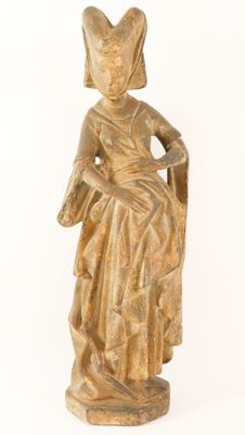 an old statue of a woman sitting on a chair with a hat on her head