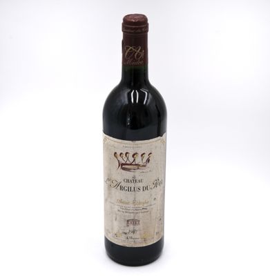 a bottle of wine that is sitting on a table