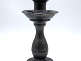 an image of a black candle holder on a white background