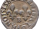 a close up of a silver coin with an image of a man on it