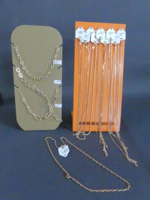 a lot of different necklaces and bracelets on display